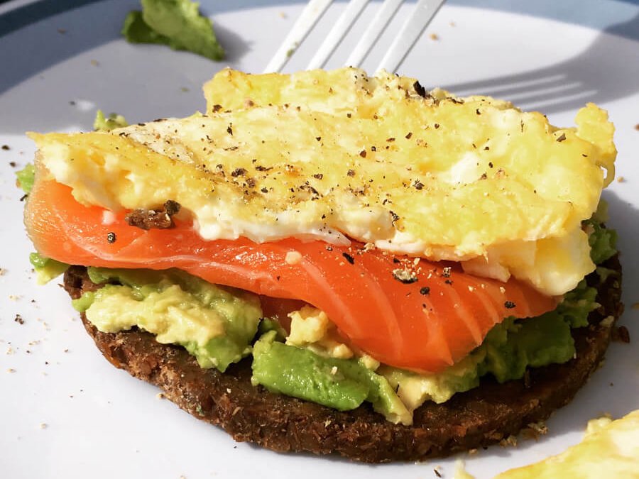 ...place avocado and salmon on it Quickly assemble the scrambled eggs (just...